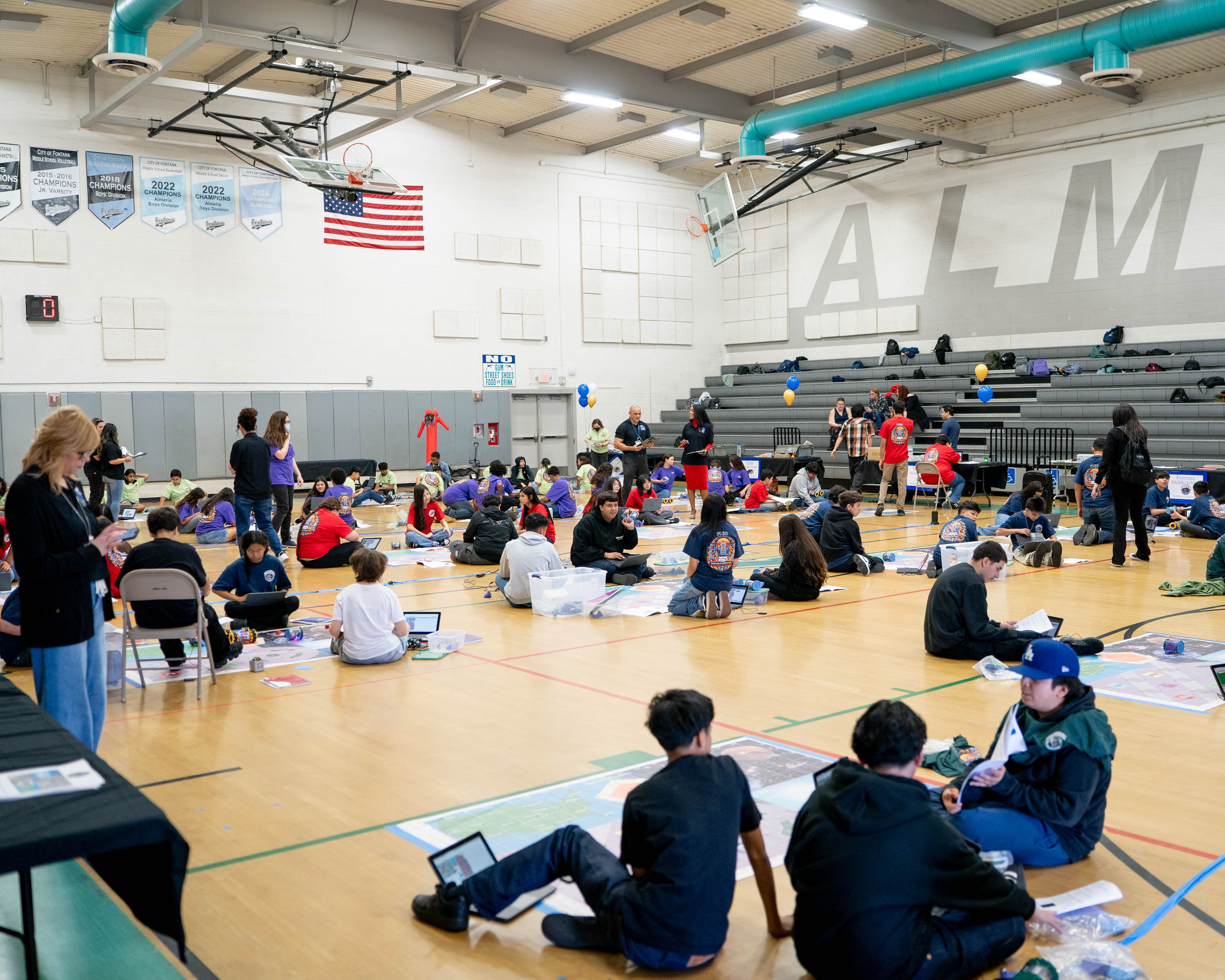students working on the roboplay challenge floor