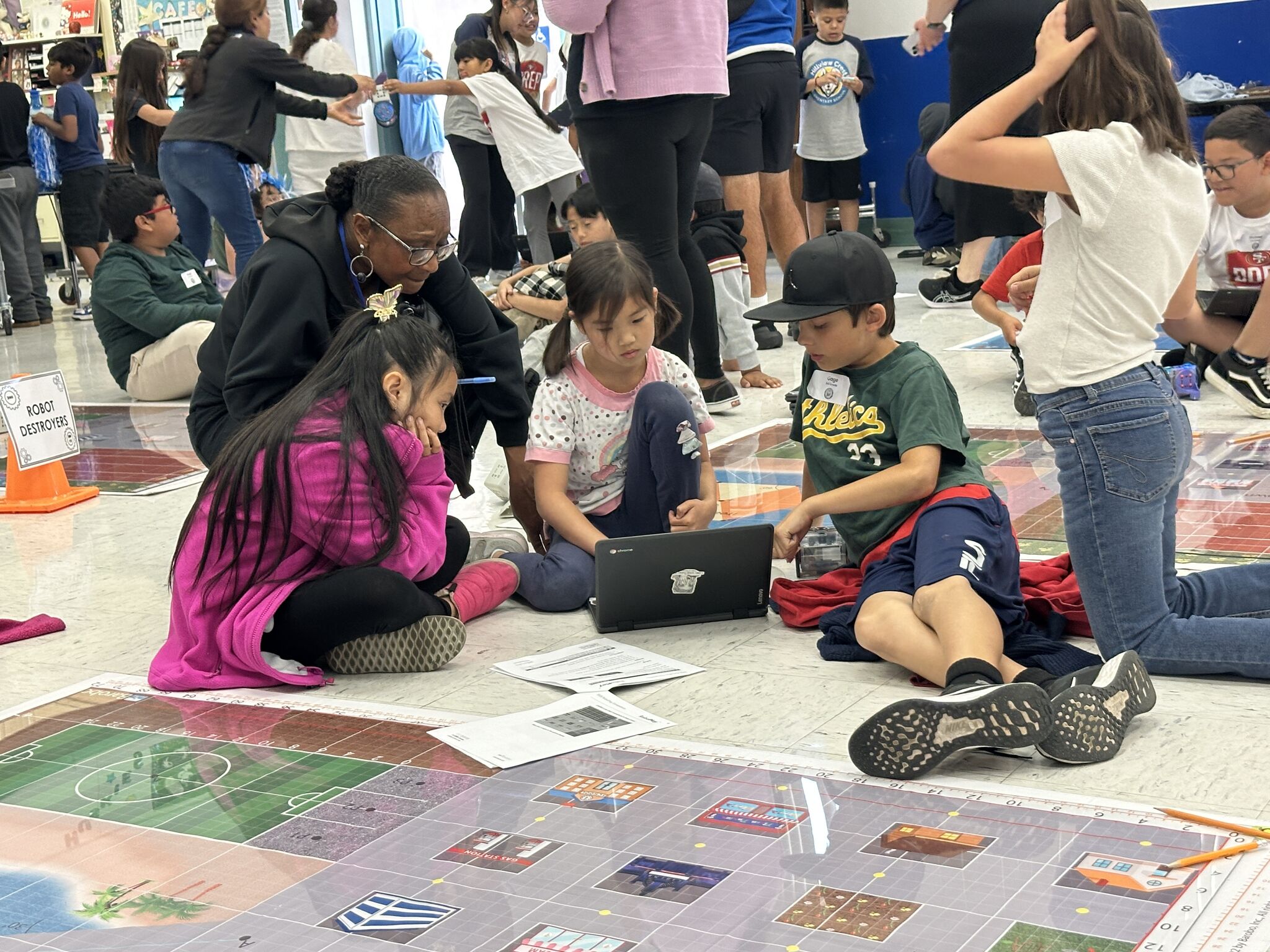 students programming a robot