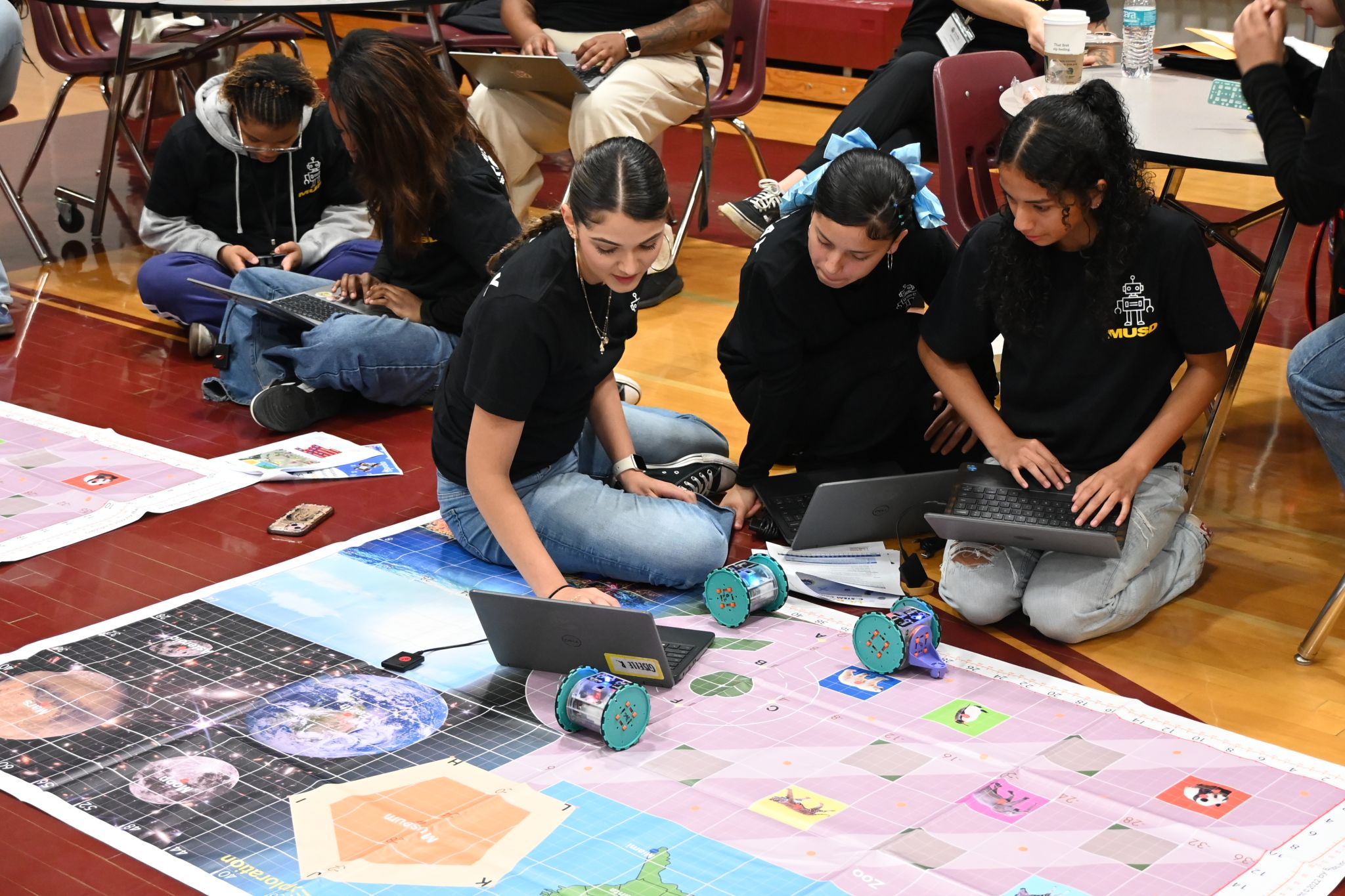 students programming a robot