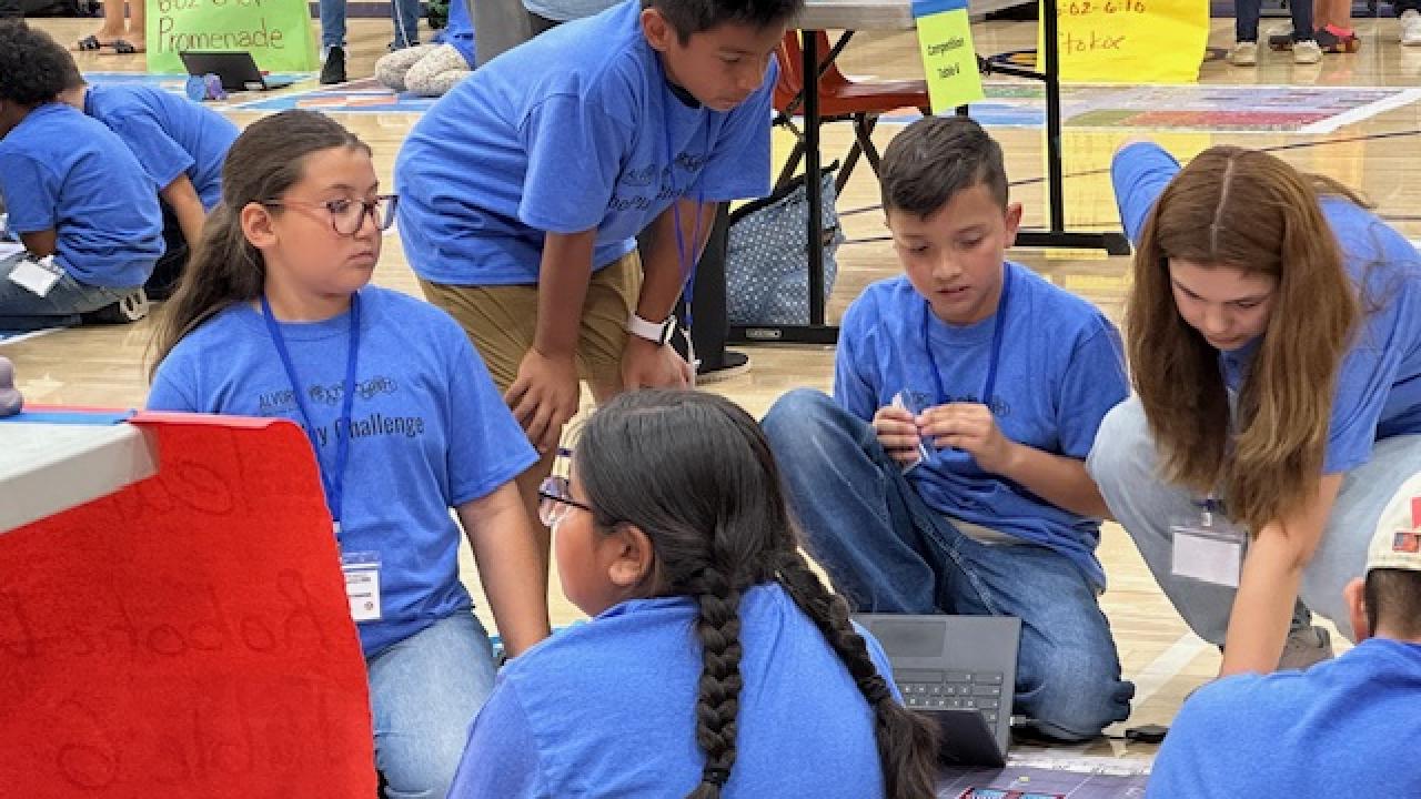 students programming a robot