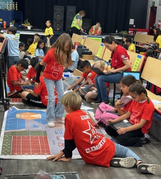 students programming a robot