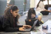 students programming a robot